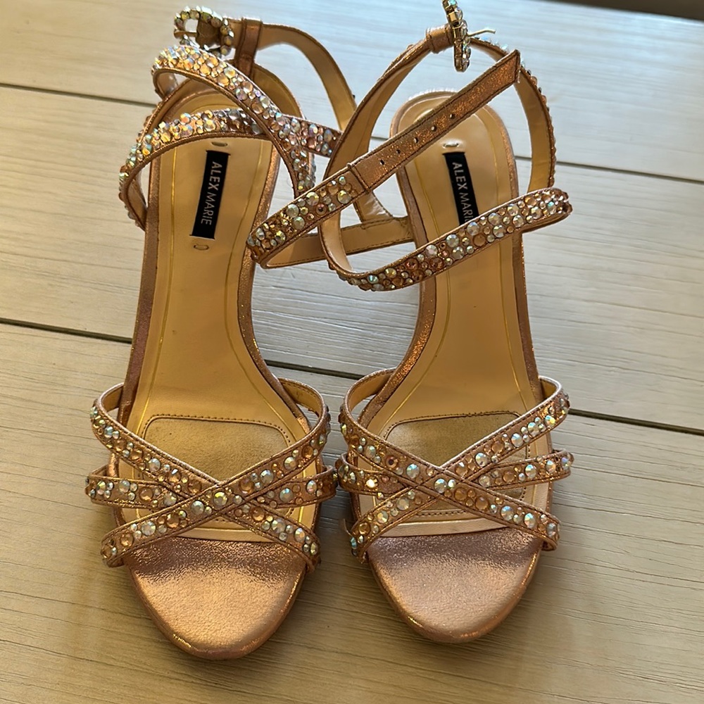 Beautiful size 6.5 women’s heels. Rose gold with jewels